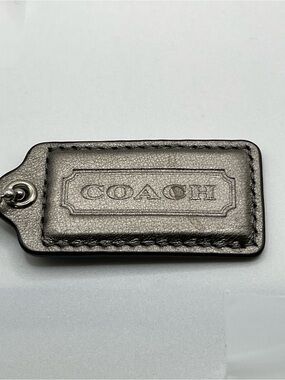 COACH Gray Iridescent Leather Embossed Hang Tag